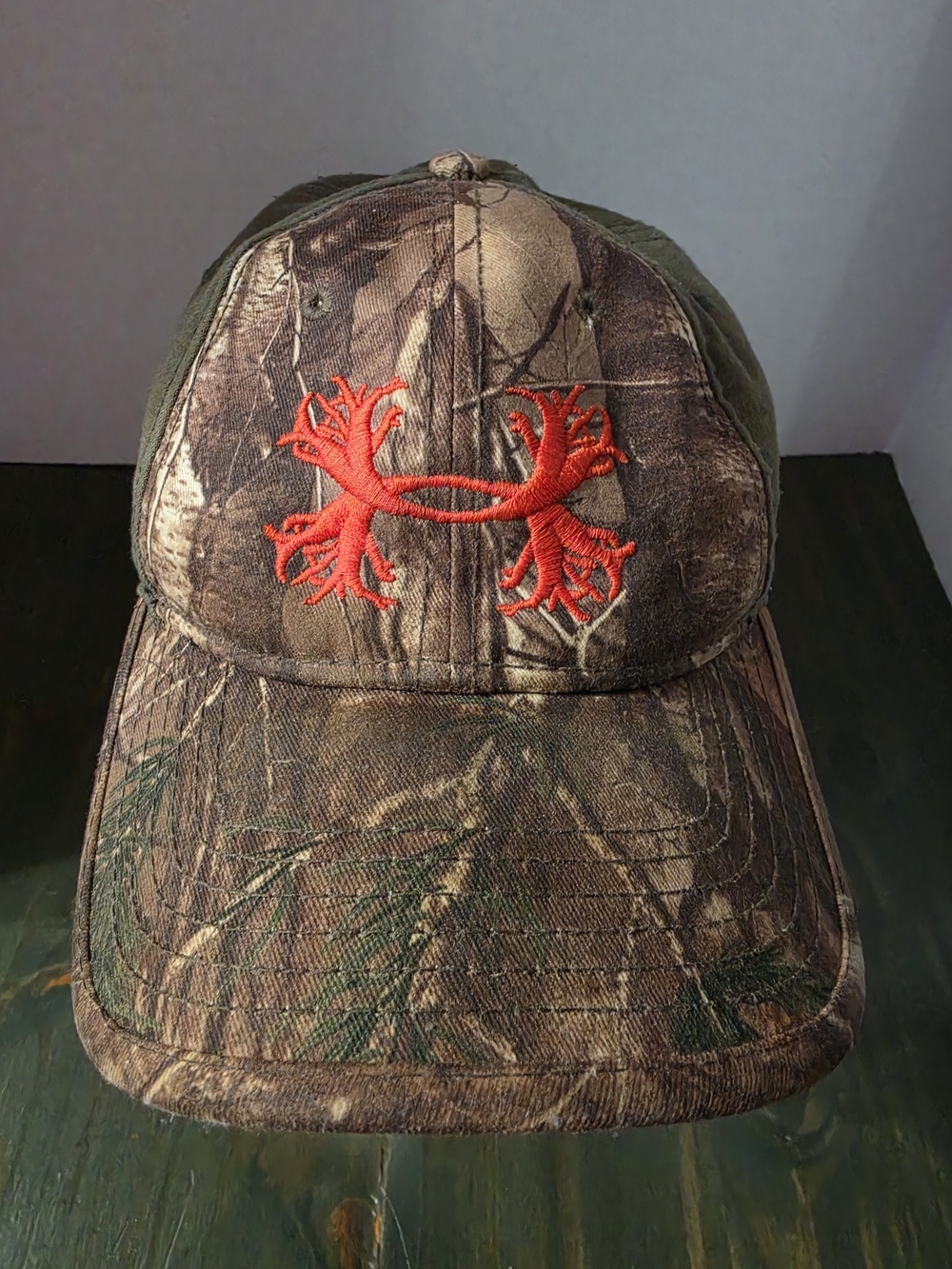 Under Armour Men’s Realtree Camo Cap with Orange Embroidered Logo